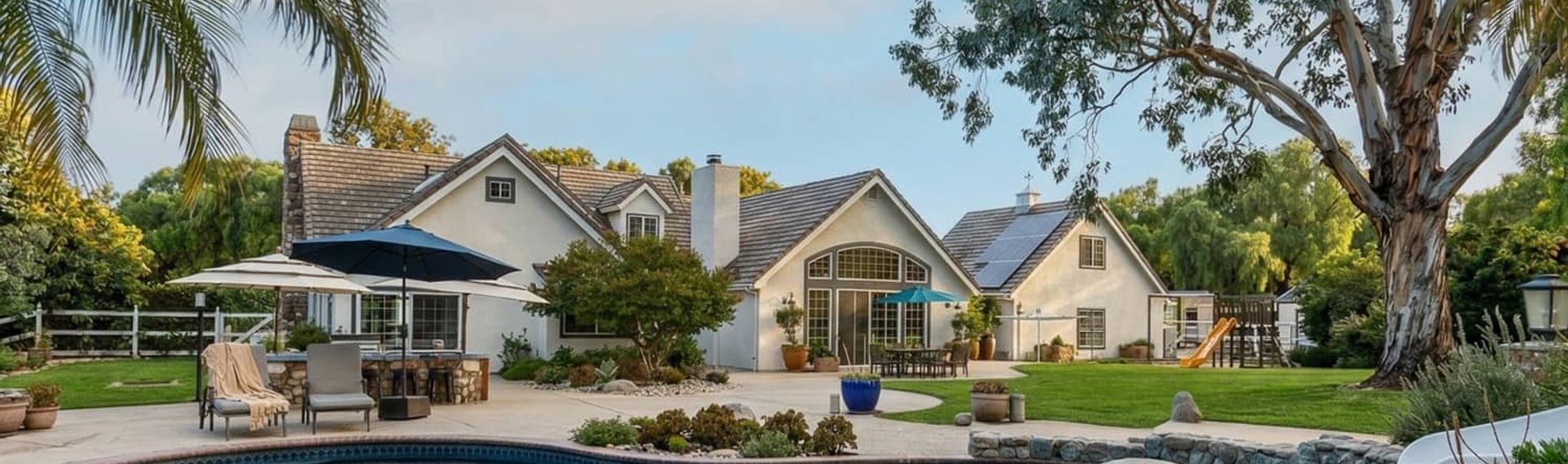 Suburban homes at sunset, Victorian streetscape behind the hero